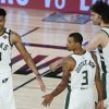 George Hill, Giannis Antetokounmpo and Robin Lopez