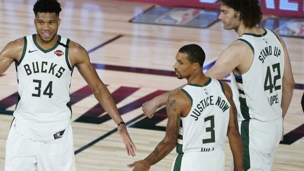 George Hill, Giannis Antetokounmpo and Robin Lopez