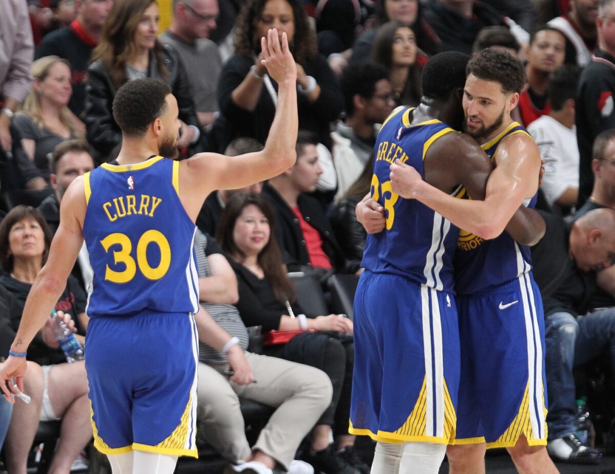 Stephen Curry, Draymond Green and Klay Thompson