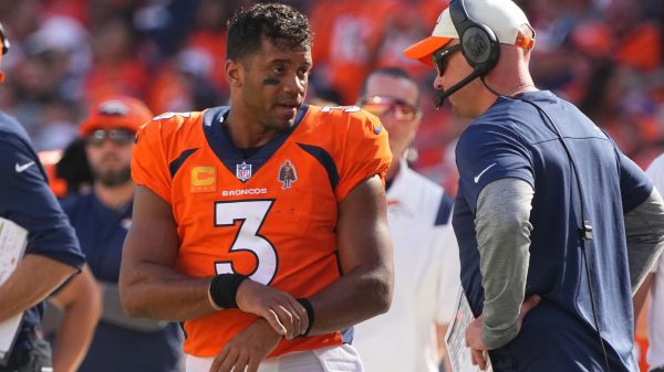Russell Wilson and Nathaniel Hackett