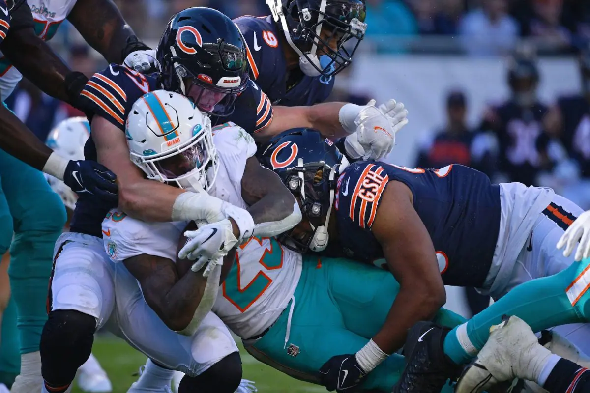 Travis Homer runs through, around and past the Chicago defense