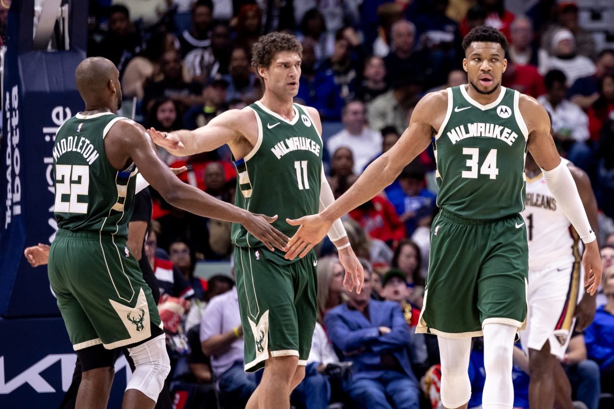 Giannis Antetokounmpo, Khris Middleton and Brook Lopez